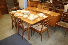A teak Macintosh sideboard table and six chairs