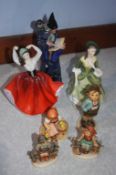 A Royal Doulton 'Wizard', two Doulton Ladies and Four Hummel figures
