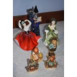 A Royal Doulton 'Wizard', two Doulton Ladies and Four Hummel figures