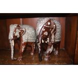 Two carved wood and inlaid elephants