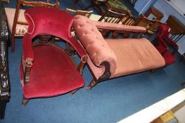 An Edwardian chaise long and a pair of tub chairs