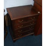A small reproduction mahogany chest of drawers