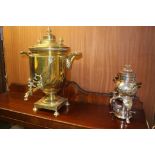 A brass samovar and a coffee pot