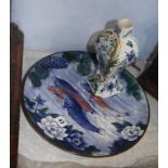 A Continental earthenware faience vase and Japanese Imari wall plate