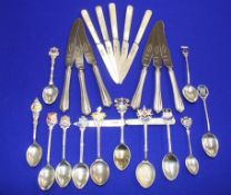 Six silver grapefruit knives with mother of pearl handles, various silver spoons etc.