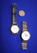 Two gents wristwatch and a 1/2 dollar coin