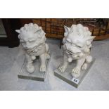 Pair of modern oriental lions on stands 26cm Height
