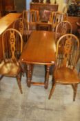 Oak gateleg table and four Windsor chairs
