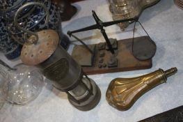 Miners lamp, scales and a powder flask