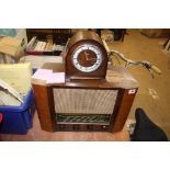 Walnut radio and a mantle clock