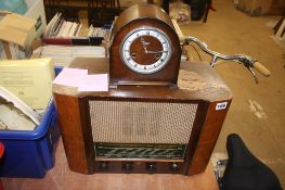 Walnut radio and a mantle clock