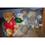 Large quantity of soft toys on three shelves