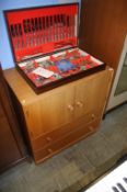 A Meredew pale oak tow door cabinet