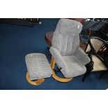 Reclining armchair and footstool