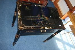 An Oriental lacquered style drawer side table