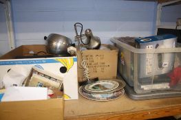 A shelf containing wool, stamps, china etc.