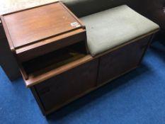 A teak telephone seat