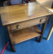 An Ercol oak single drawer side table, 76cm wide