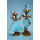 A pair of turquoise and amber Murano glass figurines