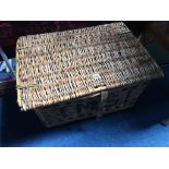 A wicker work picnic basket