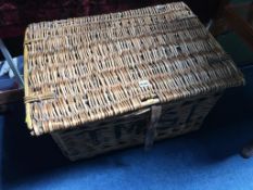 A wicker work picnic basket