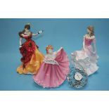 Eight Royal Doulton figures and a glass clock