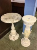 Two veined marble pedestals