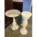 Two veined marble pedestals