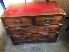 A reproduction mahogany Campaign style chest of drawers, with two short and two long drawers, with