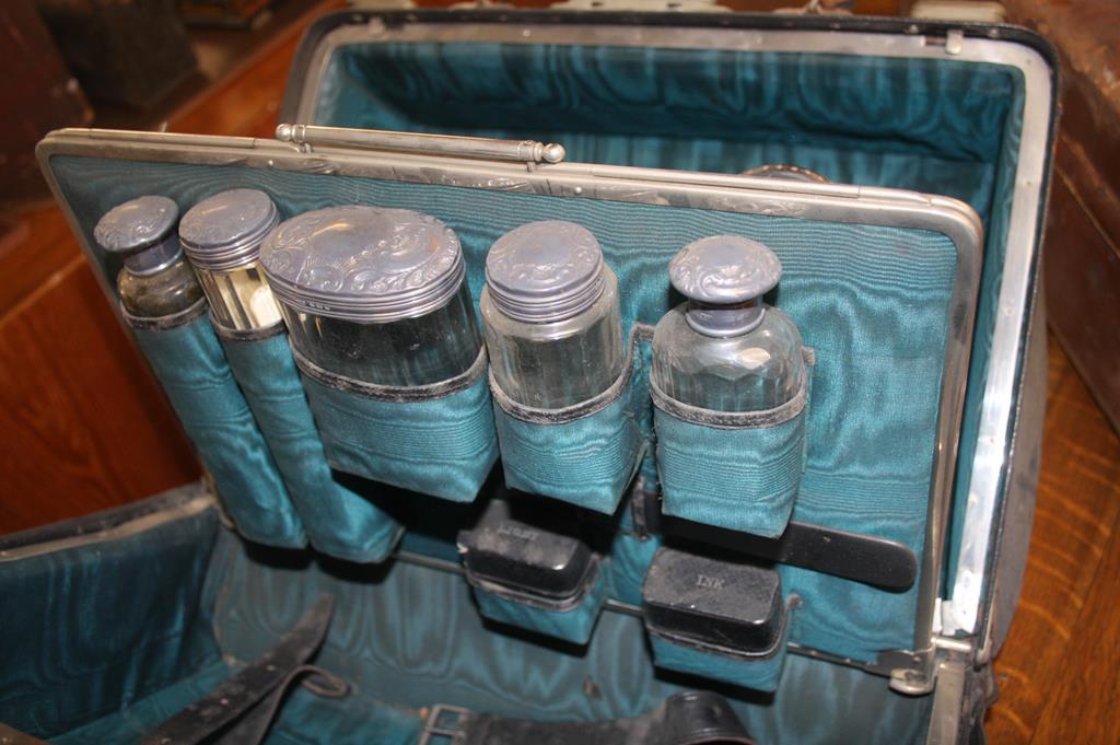 A John Pound leather case and a travelling vanity case, with five silver top bottles - Image 3 of 10