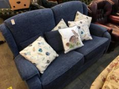 A blue two seater settee