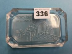 A North East Coast Exhibition Newcastle 1929, clear and etched glass ashtray. 12cm wide