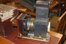 A Magic Lantern with case, various Thornton Pickard lenses and a collection of glass slides,