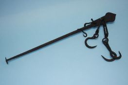 A cast iron meat hook