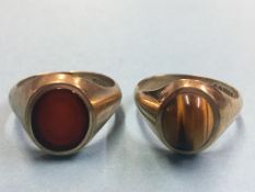 A Gents 9ct gold Tiger's eye and a 9ct signet ring. Total weight 12.1 grams