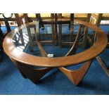 A G Plan teak circular coffee table, with inset glass top