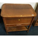 An oak sewing box with single drawer