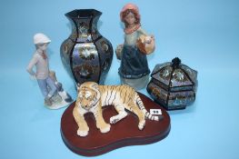 A model of a Tiger, a Nao figure, a Nadal figure etc.