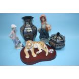 A model of a Tiger, a Nao figure, a Nadal figure etc.