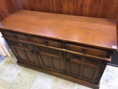 An oak Old Charm sideboard