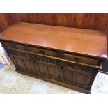 An oak Old Charm sideboard