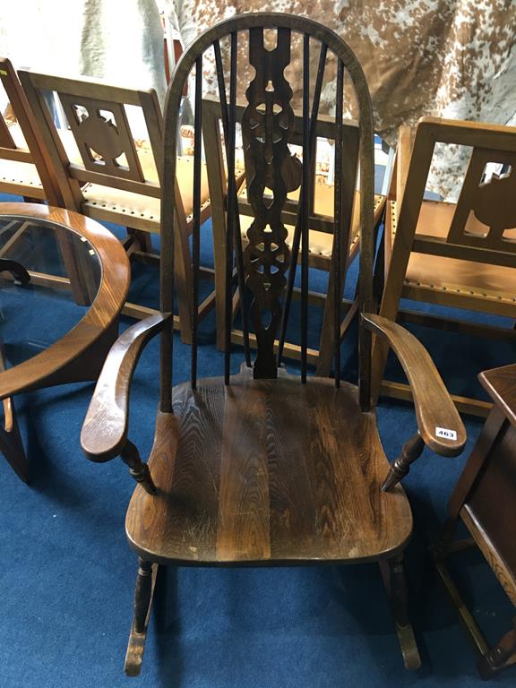 An oak Windsor rocking chair