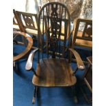 An oak Windsor rocking chair
