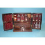 A 19th century mahogany Campaign style Apothecary travelling cabinet, with fitted drawers and