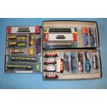 Five small trays of 'N' gauge rolling stock