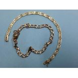 A 14ct gold (stamped 585) bracelet. Weight 7.4 grams and a 9ct gold bracelet. Weight 10.4 grams