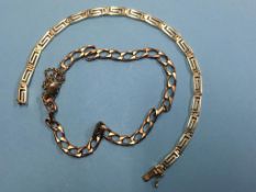 A 14ct gold (stamped 585) bracelet. Weight 7.4 grams and a 9ct gold bracelet. Weight 10.4 grams