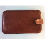 A Mulberry purple leather phone case
