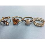 Two 9ct gold dress rings, a 585 Greek key and another. Total weight 6.4 grams