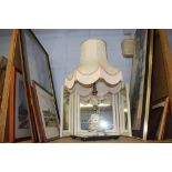 A large table lamp, assorted pictures and triple mirror